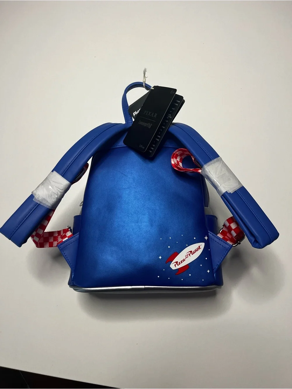 Toy Story Pizza Planet Spaceport Entry Blue Mini Backpack by Disney Pixar
